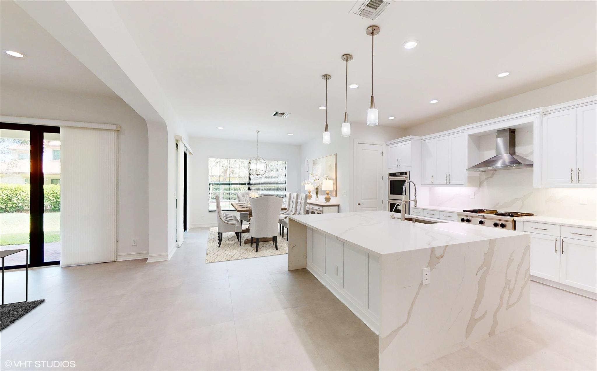 NEW CALACUTTA WATERFALL EDGE QUARTZ COUTER TOPS.