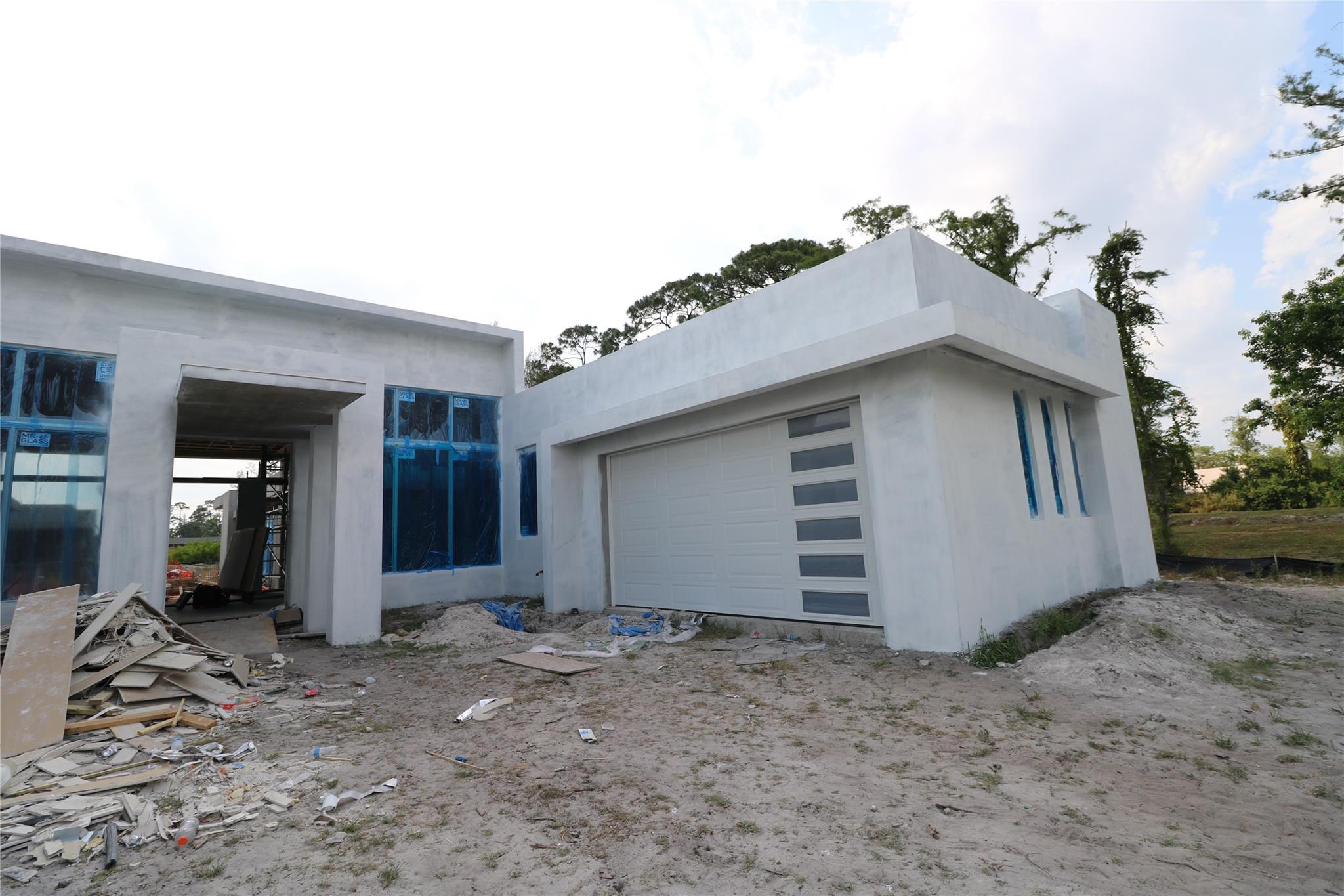 Two car garage with double door front and back to drive thru