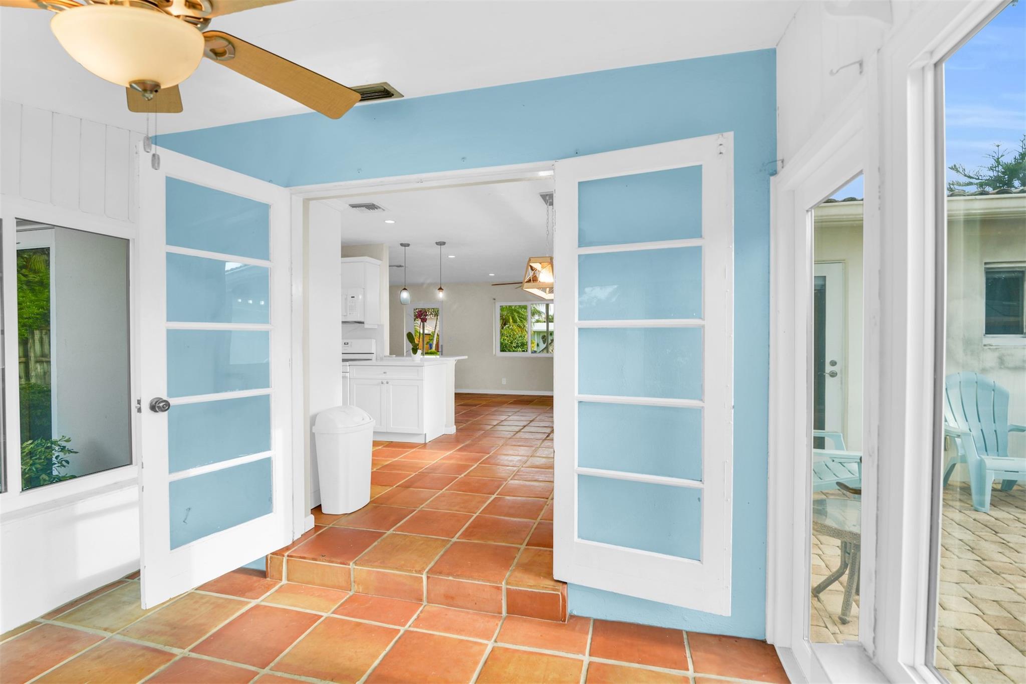 French doors from the Florida into Dining and living areas