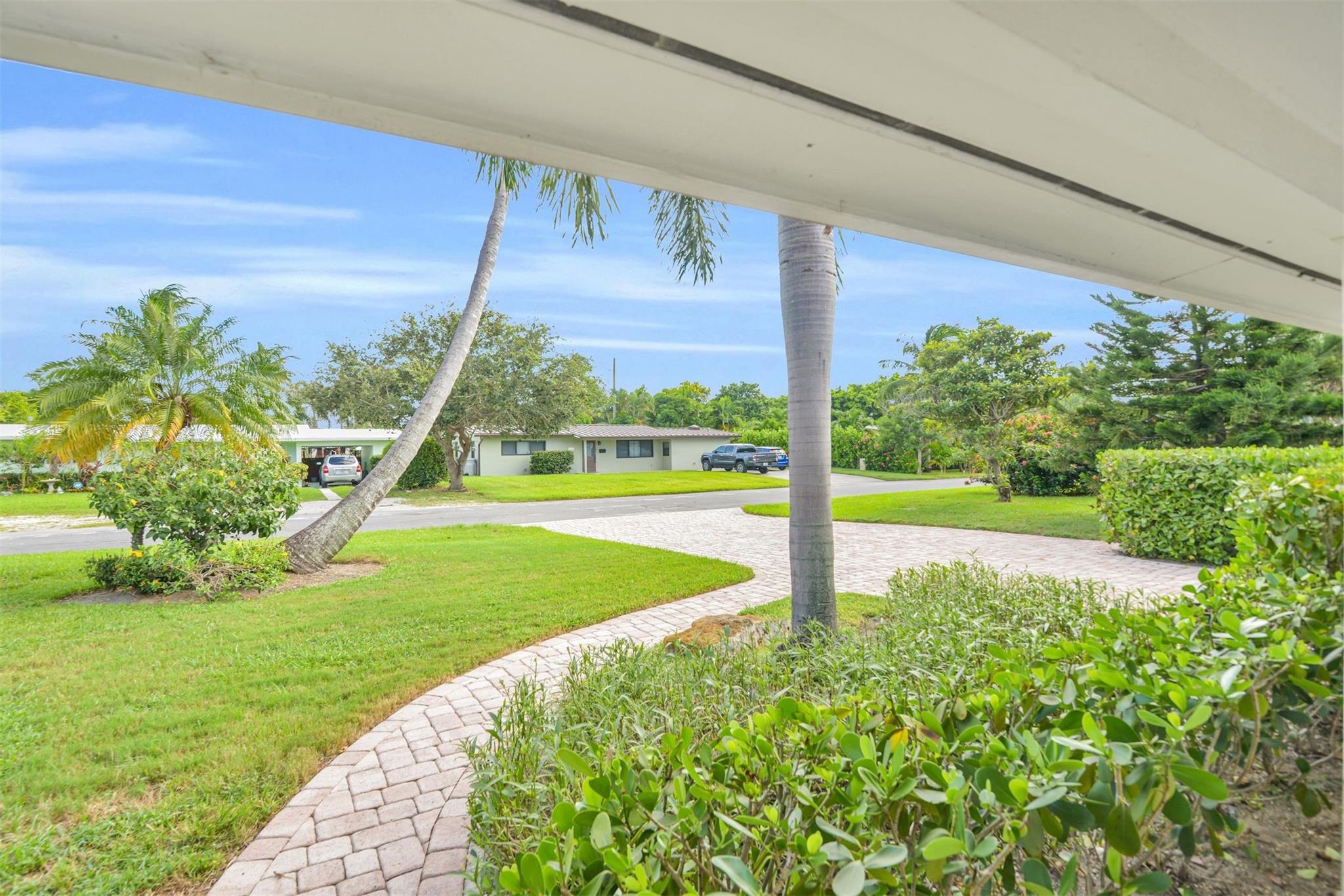 Looking out front door to  the street