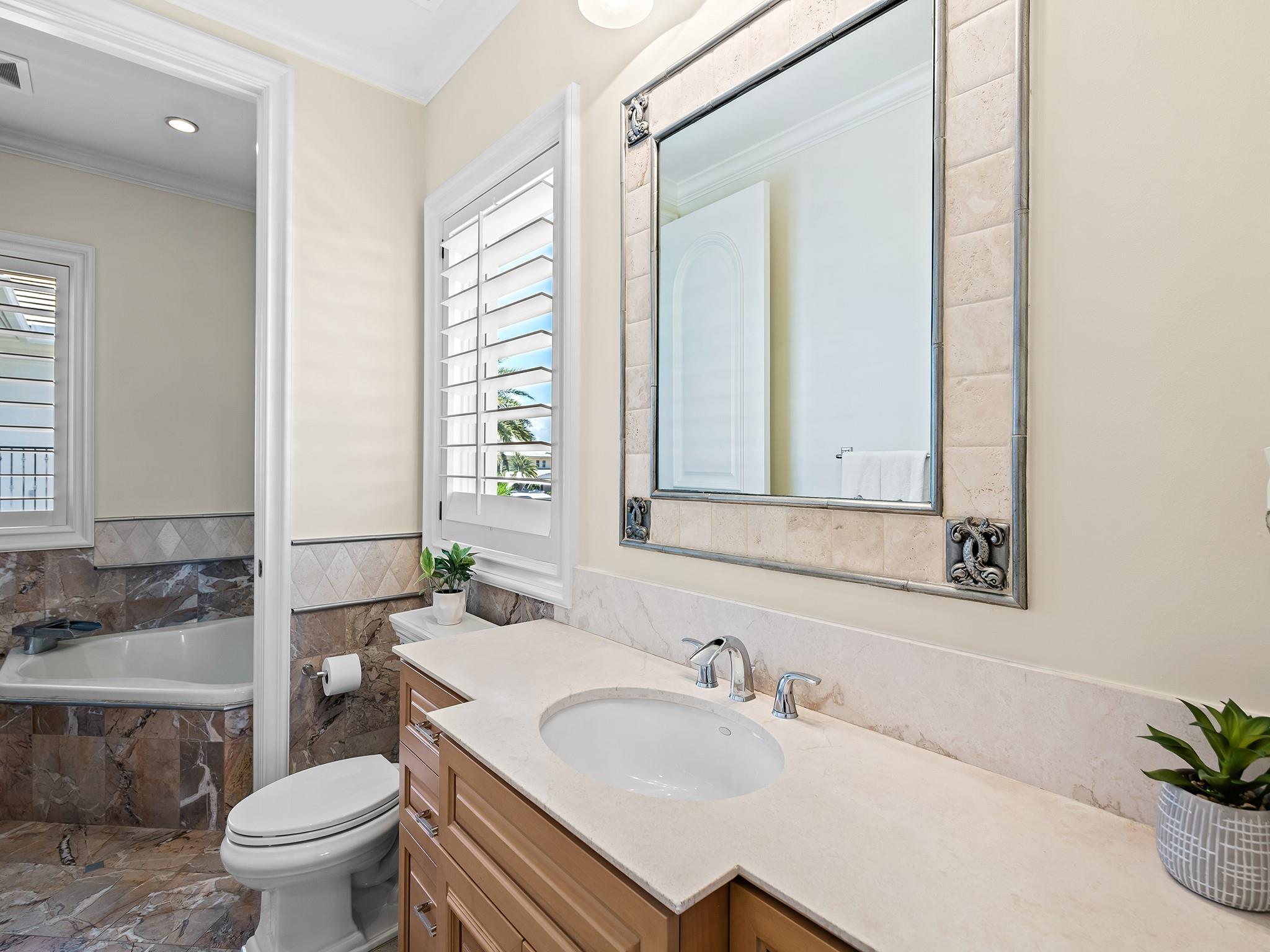 Second floor bedroom #3 jack and Jill bathroom with 2 toilets