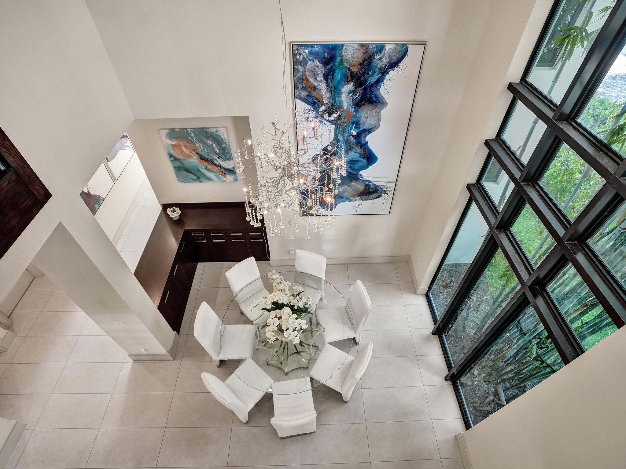 Enhanced with dramatic floor to ceiling windows!