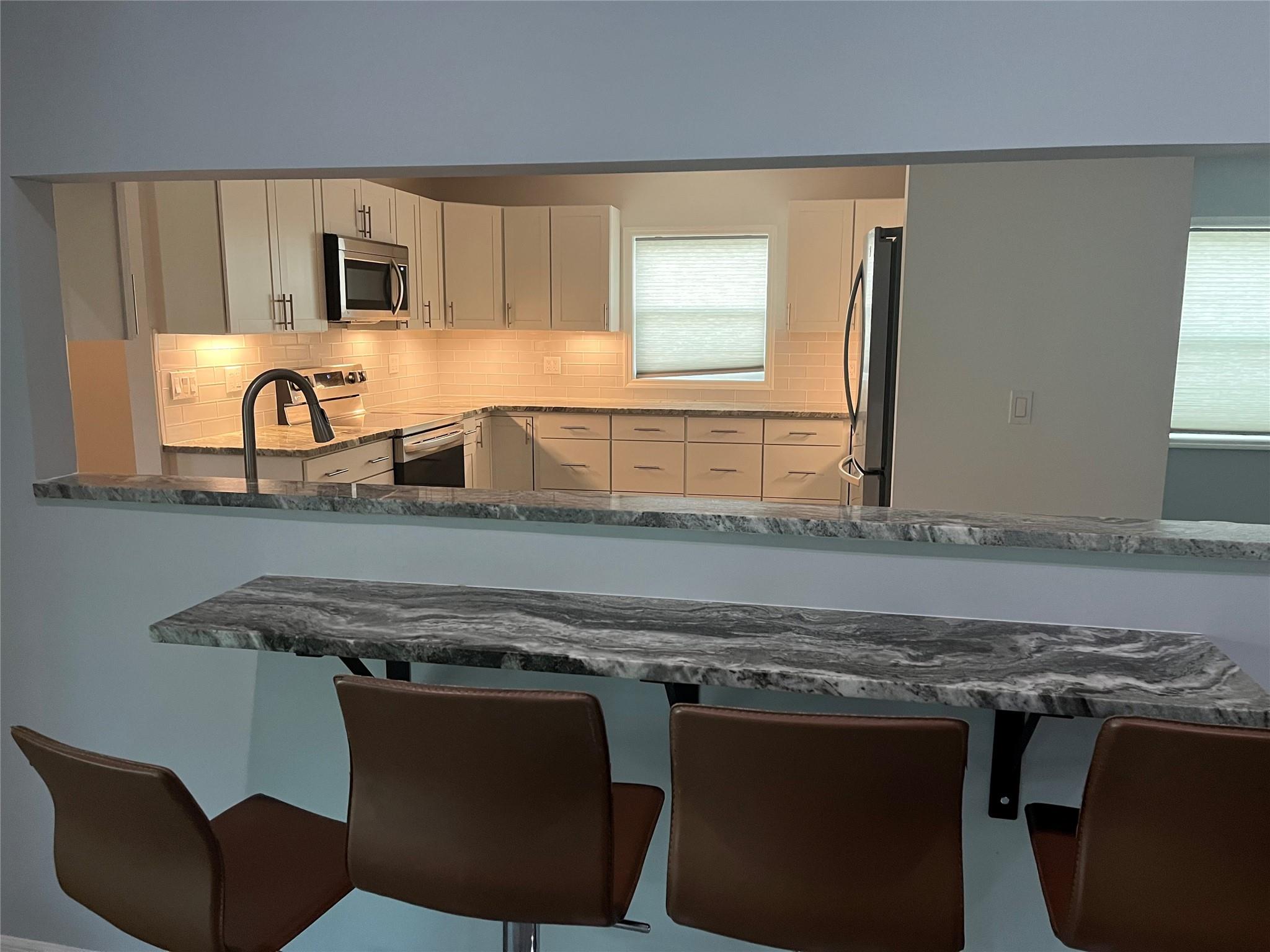 Breakfast Bar Overlooking the Kitchen
