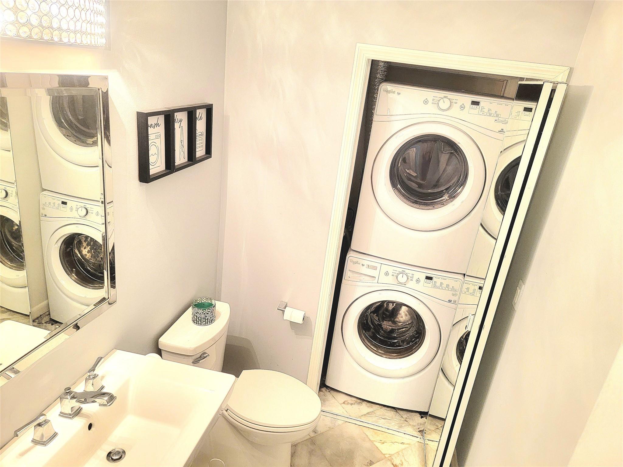 Behind sliding doors in the Half Bath