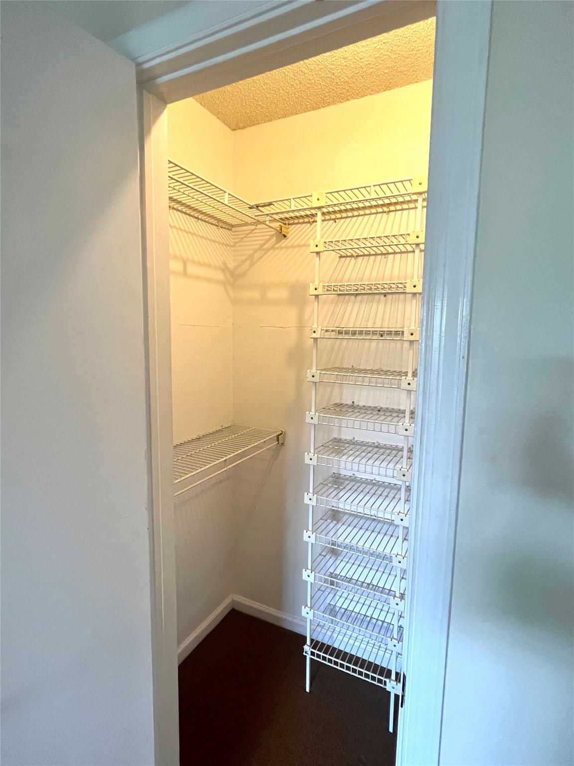 MAIN BEDROOM WALKING CLOSET