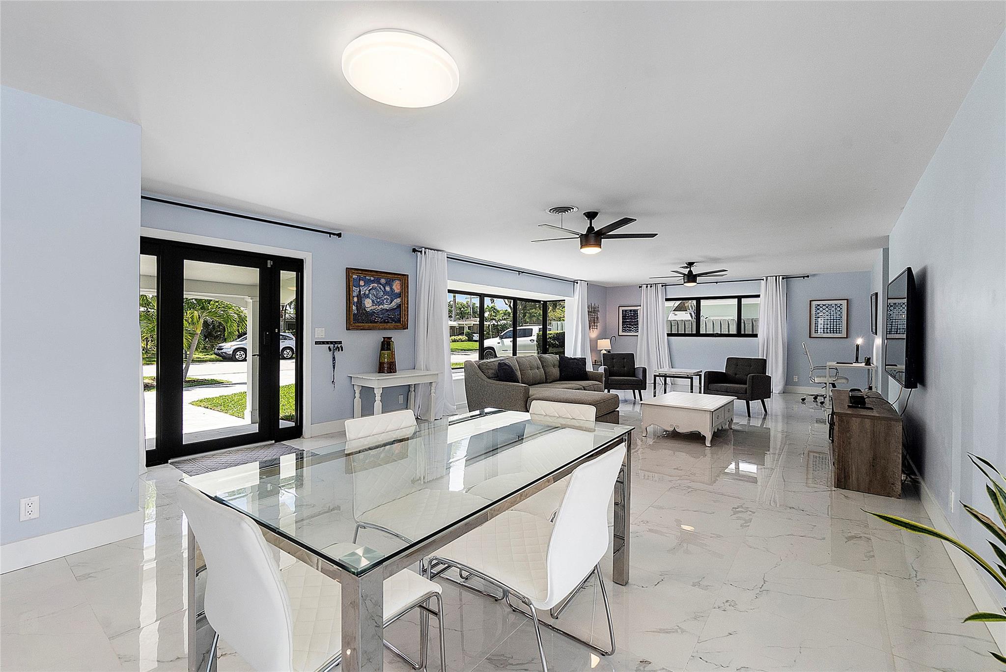 Family and dinning area with furniture.