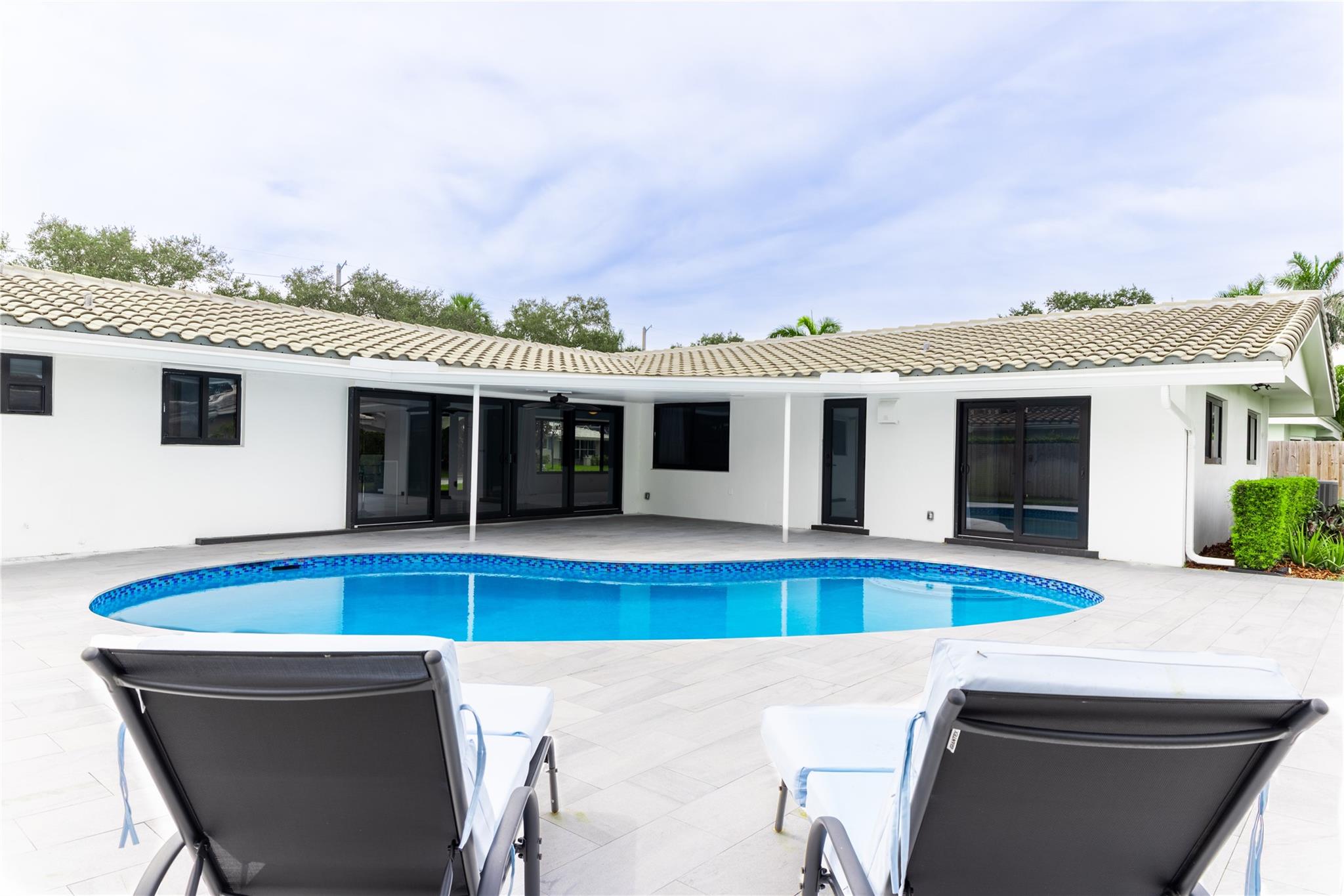 Beautiful pool with saltwater system and heat pump.