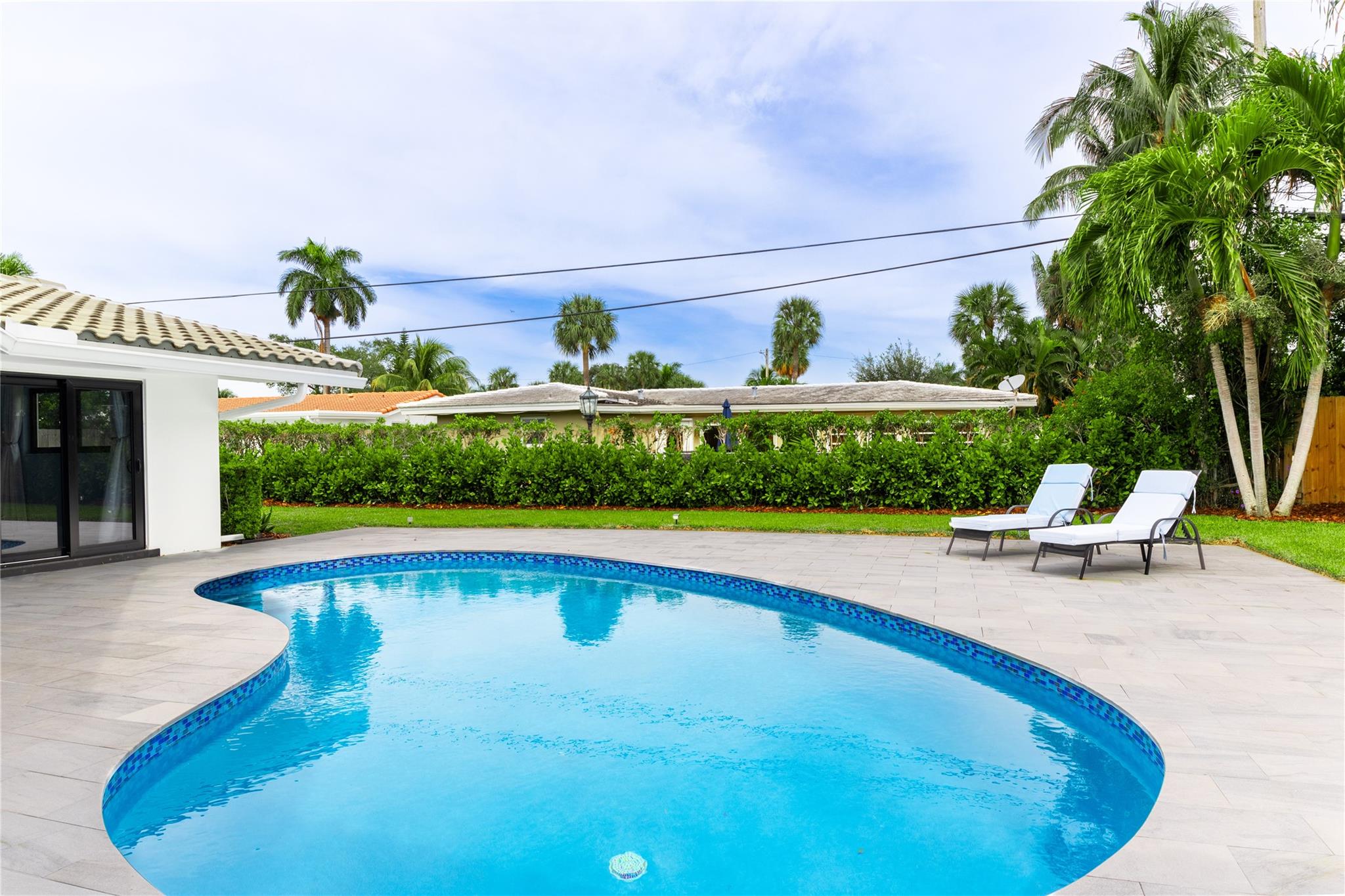 Beautiful pool with saltwater system and heat pump.