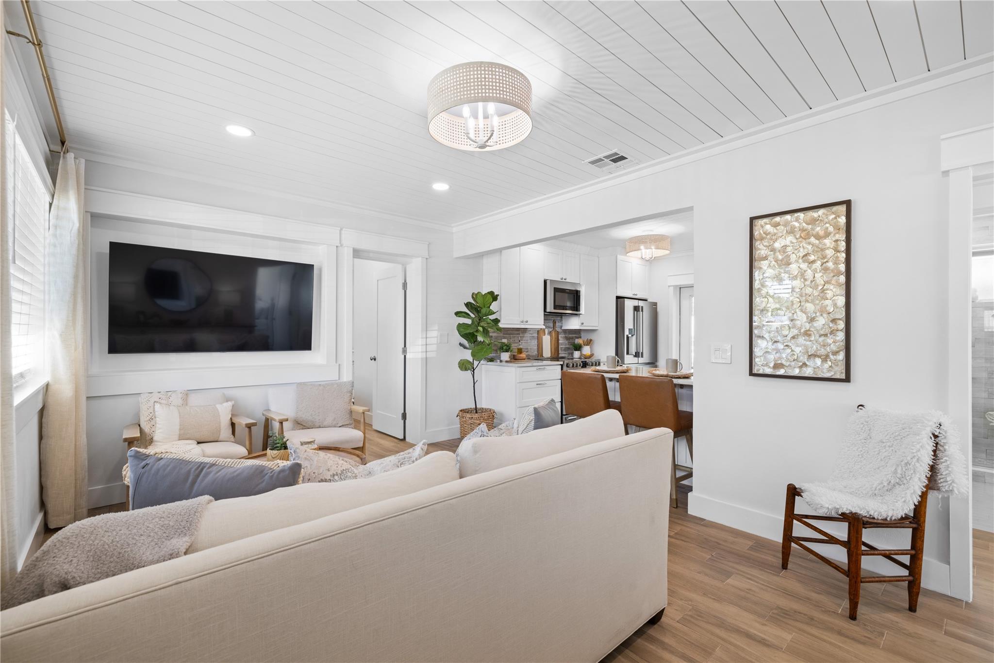Ceiling planking rounds out this perfect coastal space!