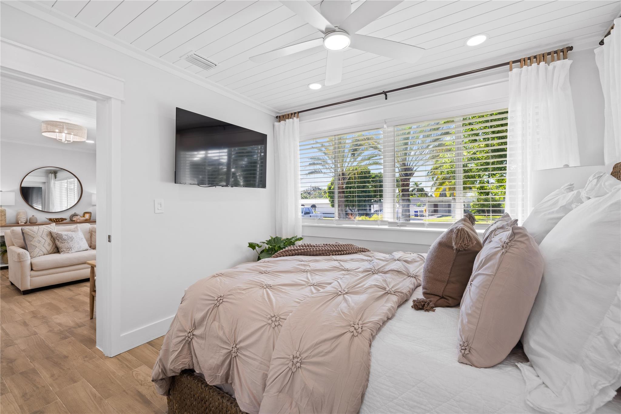 Elegant primary bedroom designed for the perfect nights sleep!