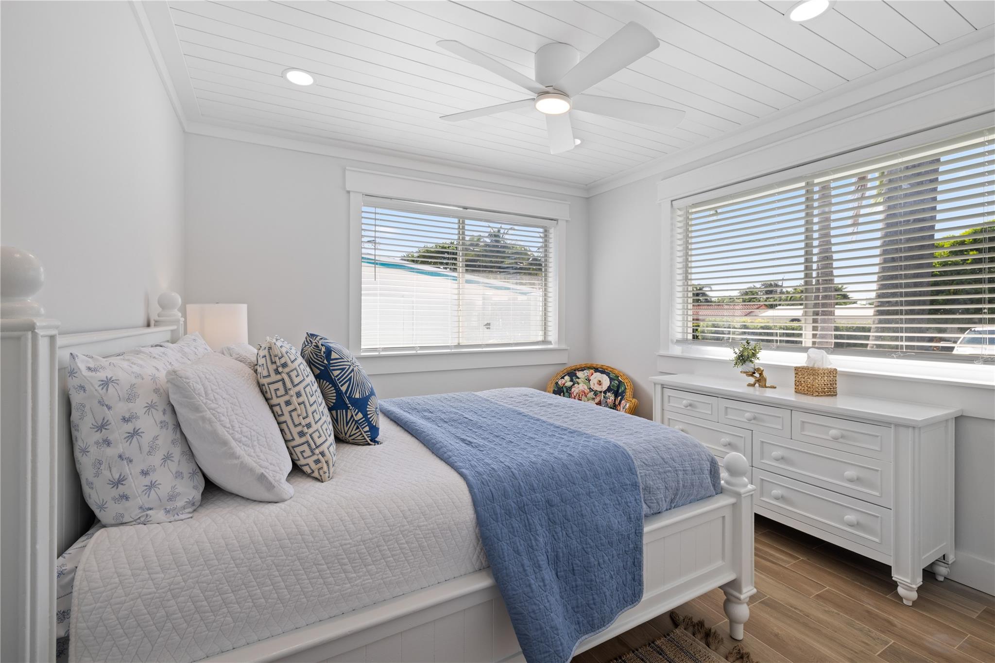 Spacious guest bedroom features amazing natural light!