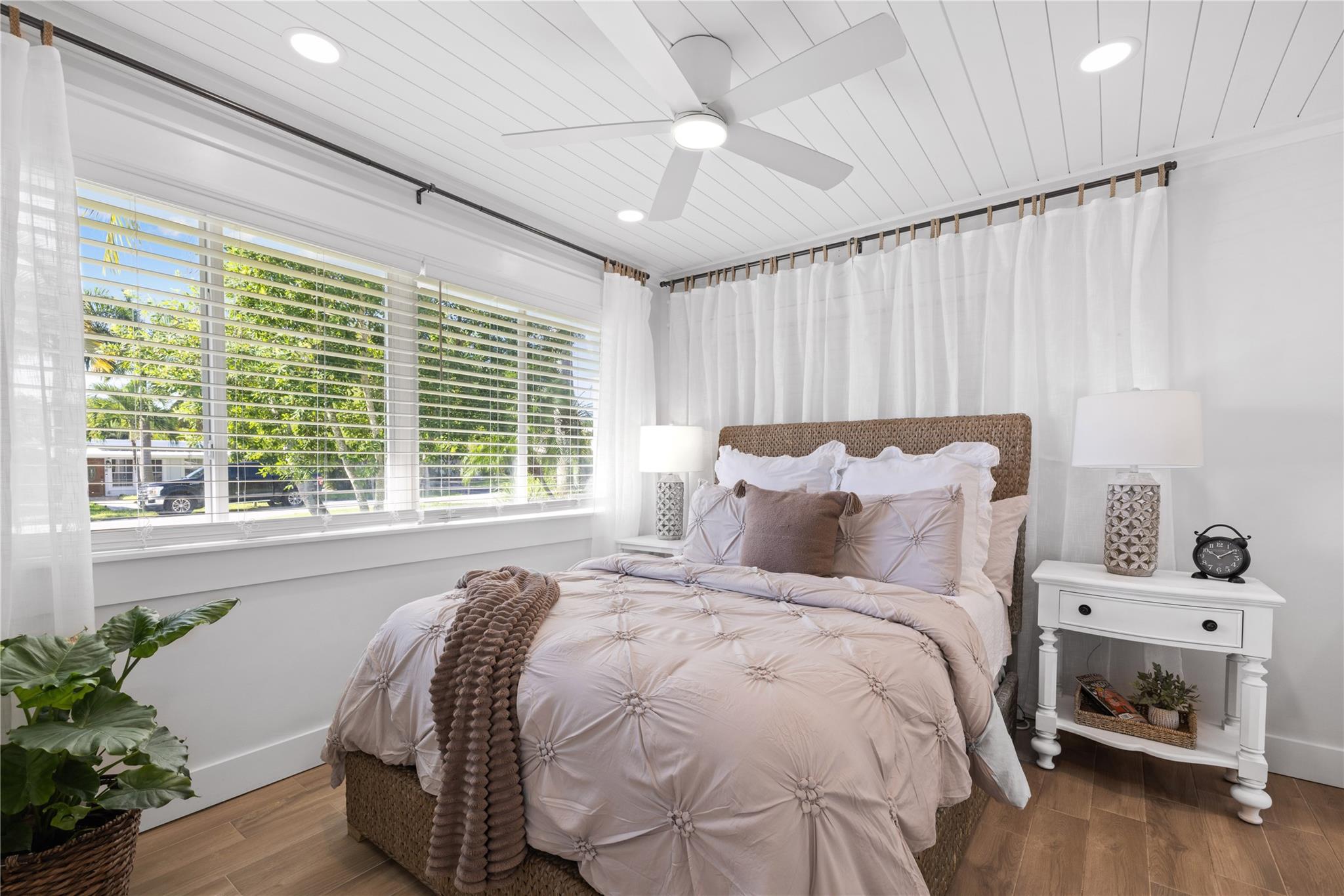 Sophisticated primary bedroom, split from guest bedrooms for privacy!