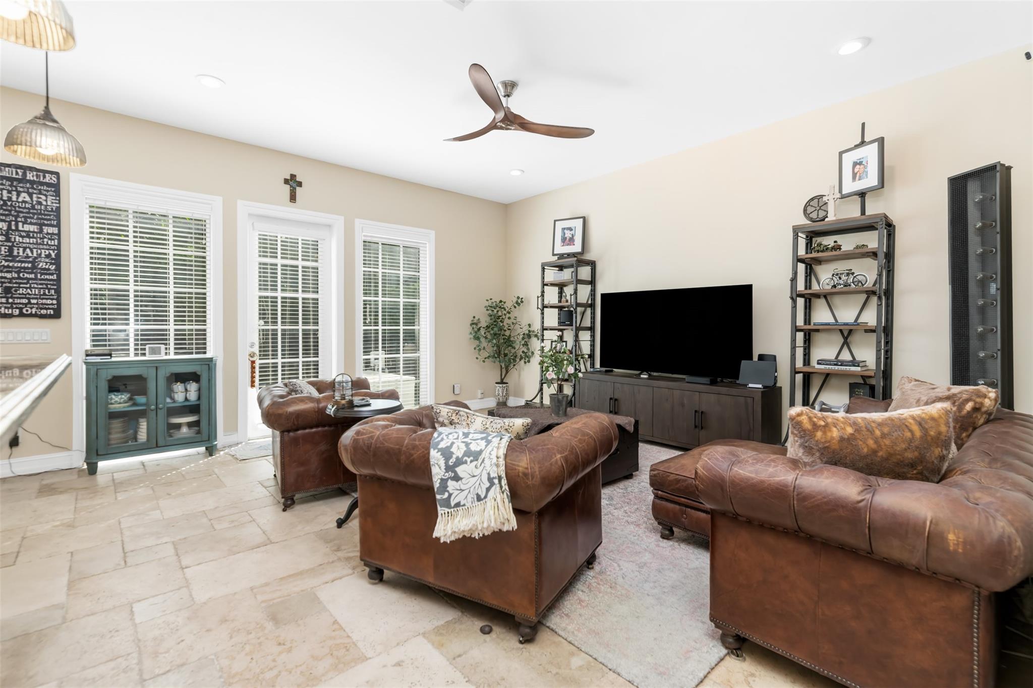 BACK FAMILY ROOM LOOKING TO BACK YARD