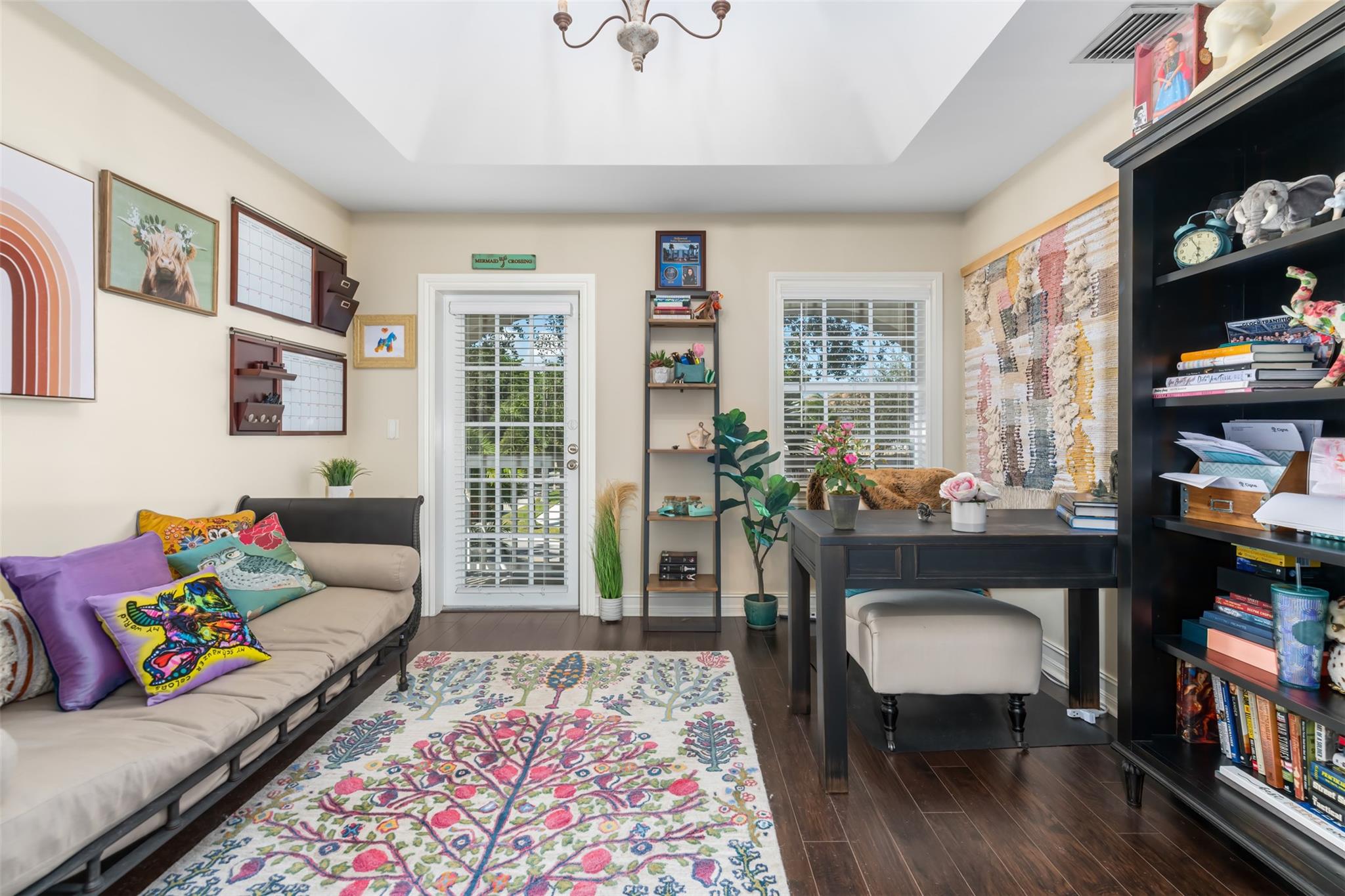 3d bedroom upstairs with door to front porch