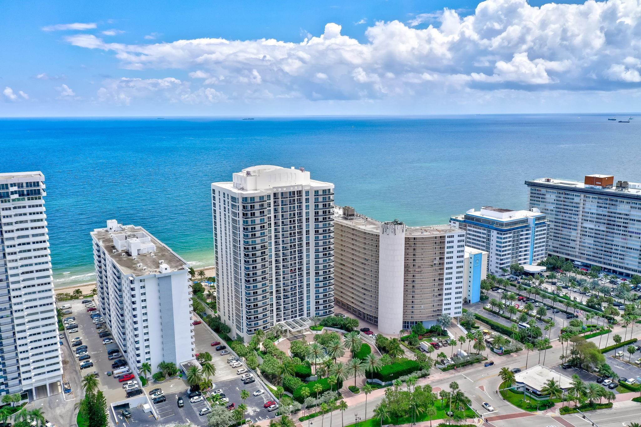 White building on the left.