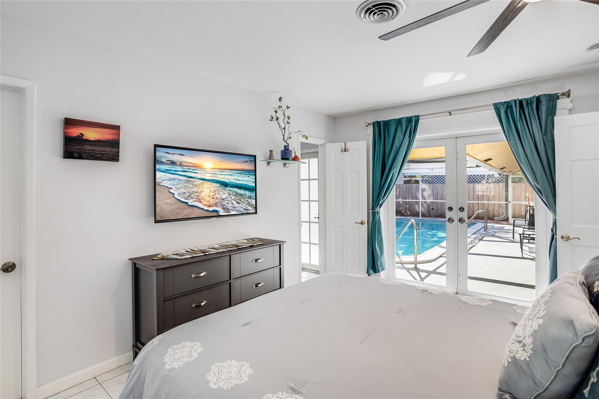 Primary Bedroom with access to the pool area