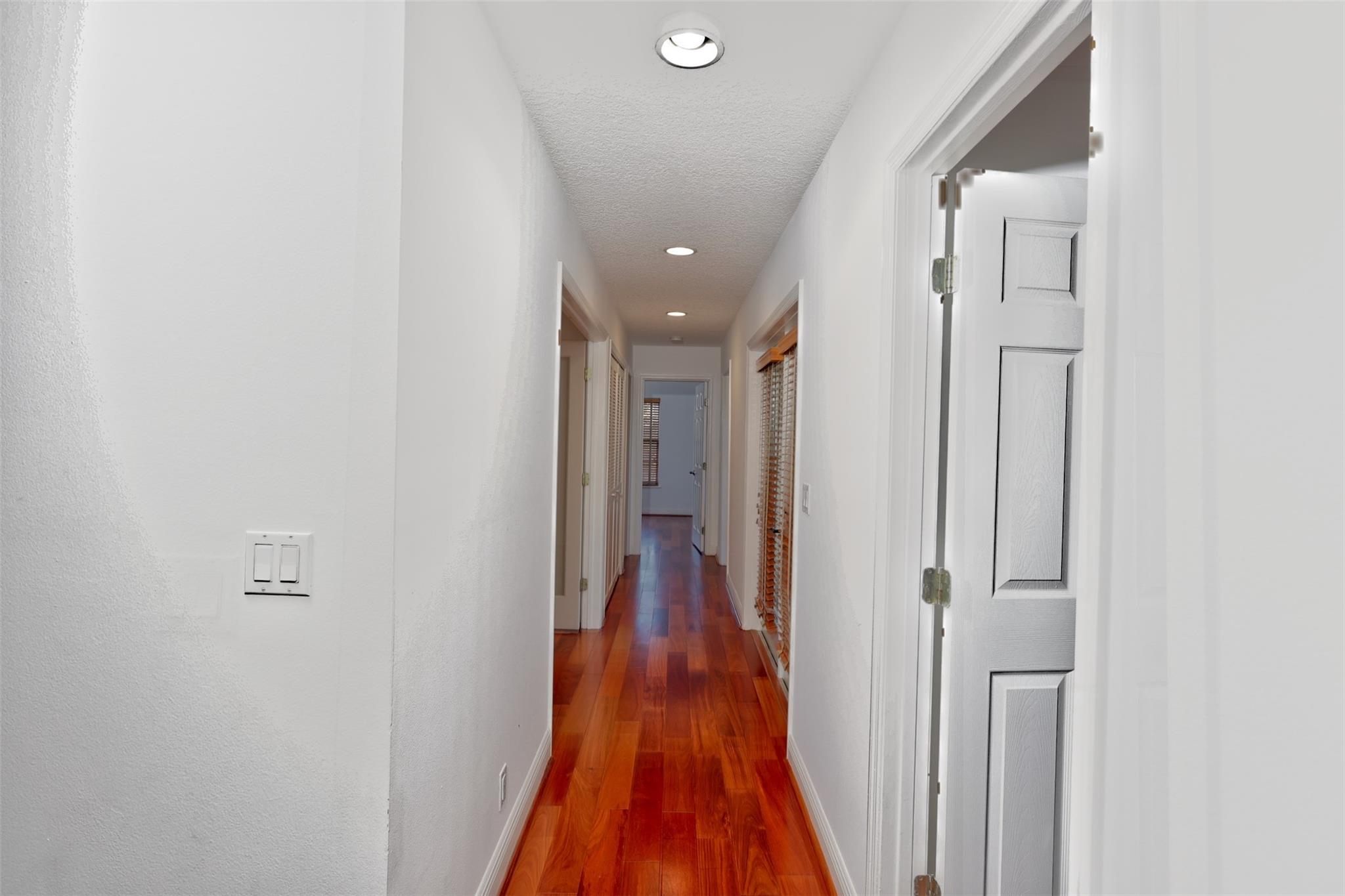Top of Stairs; 1st Door On Right: Full Ensuite; 2nd Door on Left: Office/4th Bedroom; 2nd Door on Right: Shared Balcony; 3rd Door on Left: Full Bath. 4th Door on Right: 2nd Full Ensuite Bedroom; Door At End Of The Hall: 3rd Bedroom