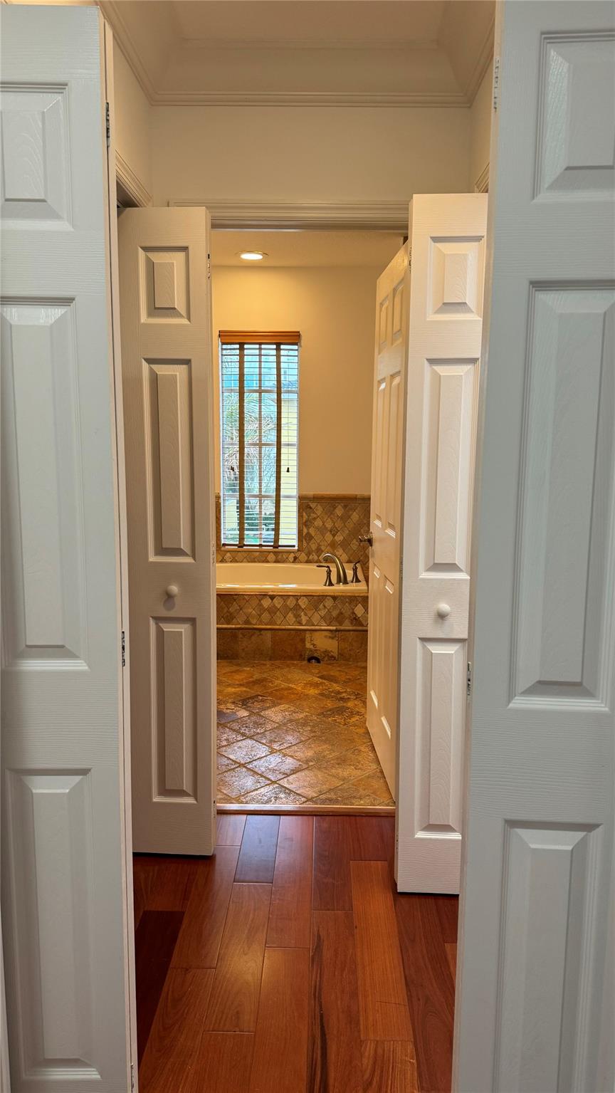 Two Full Walk-In Closets Leading To Bathroom