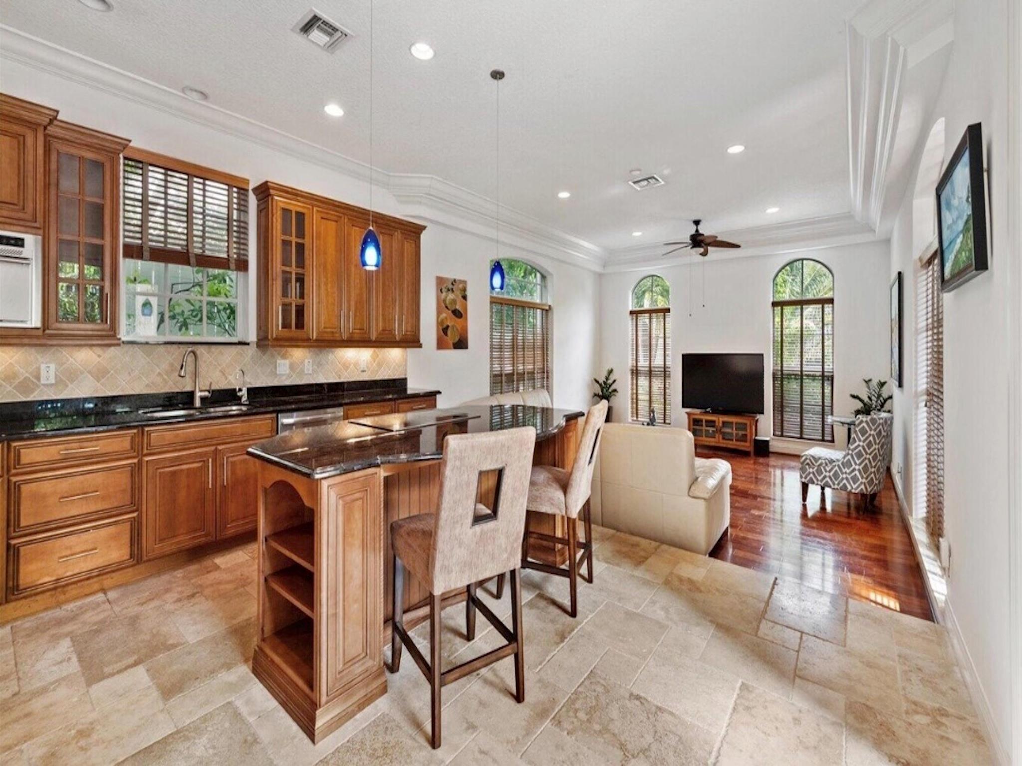 Kitchen With Adjacent Grand Living Room