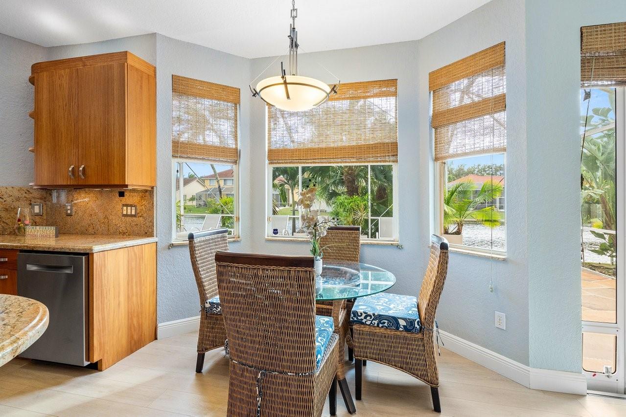 Light bright eat in kitchen with stunning patio and water views