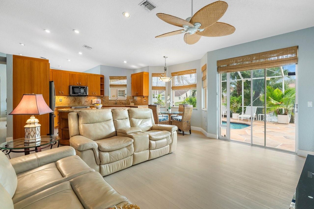 Light Bright family room abuts kitchen for family fun!