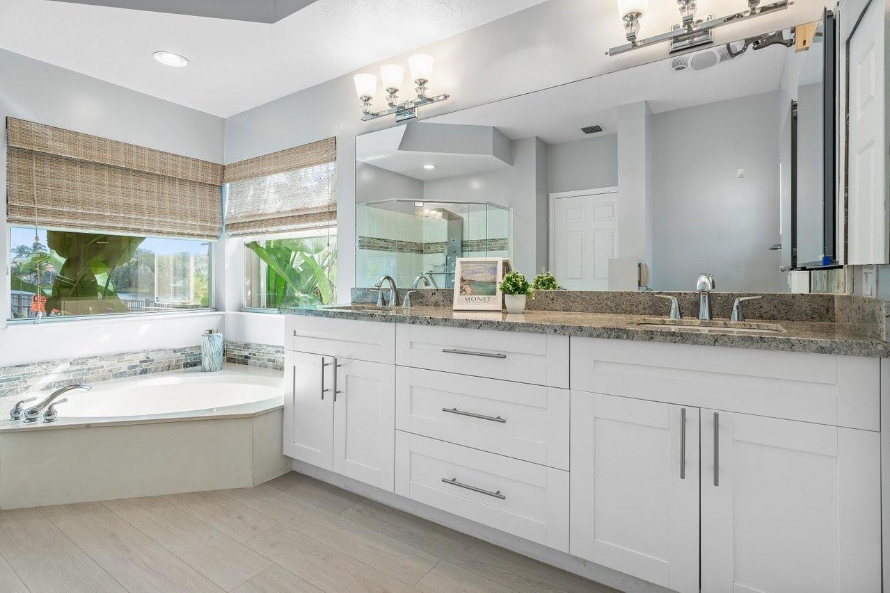 Double sinks, spa tub are just a few of the primary bathroom amenities!