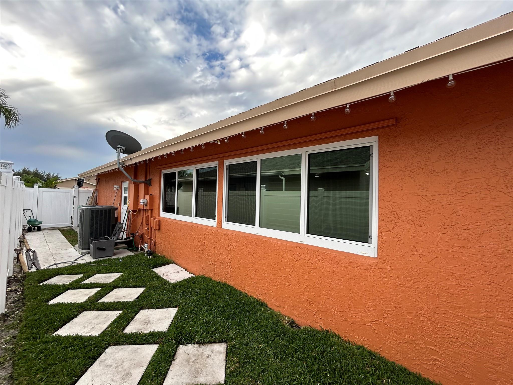 Side yard, East side of property.