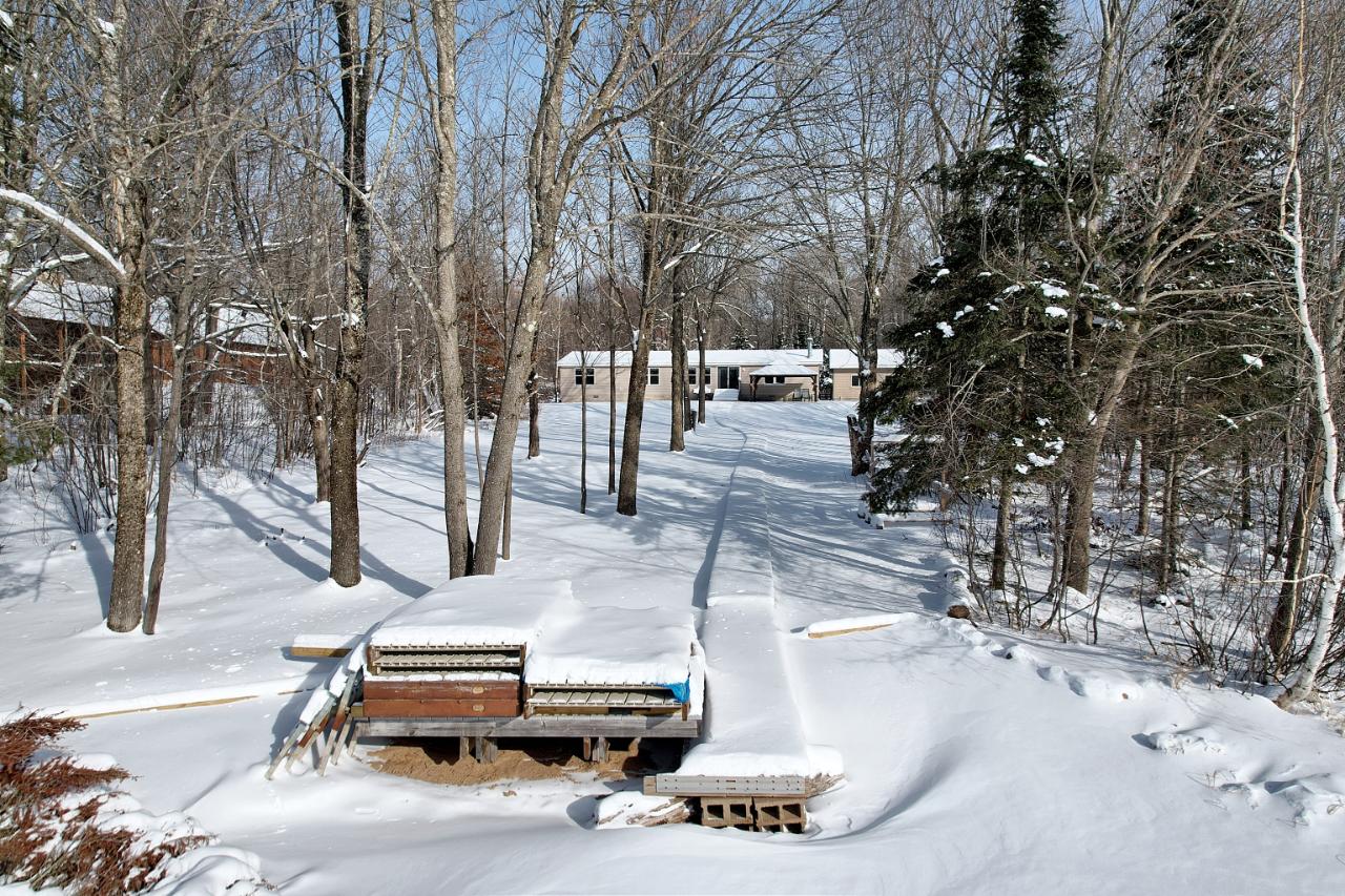Spectacle Lake Property 1104 Nicolet Shores Ln Photo 1