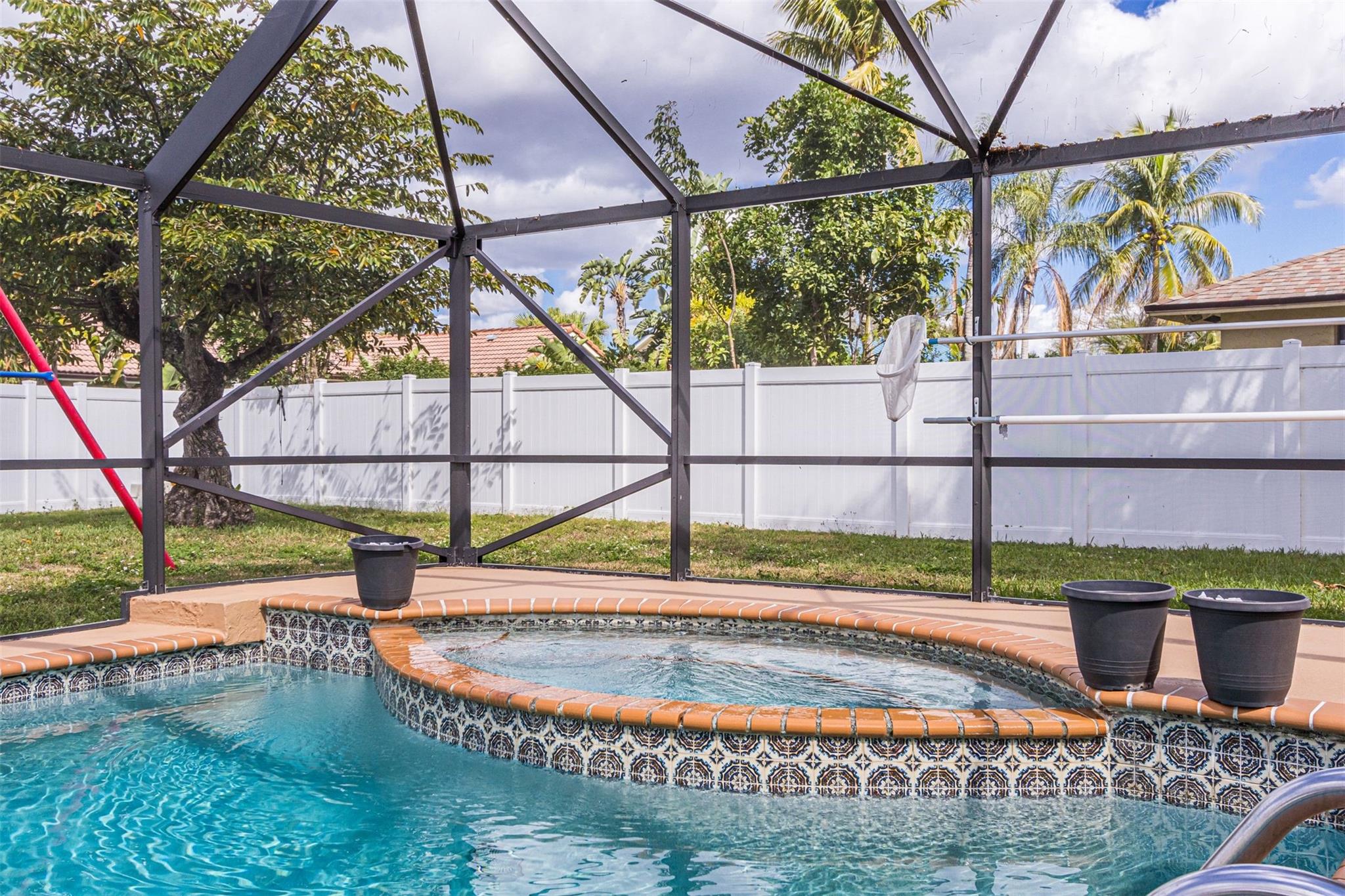 Showing pool, yard and privacy fence