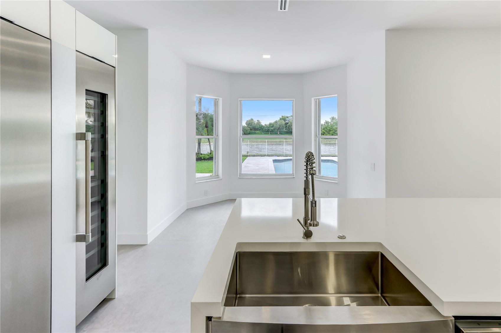 Pool & Lake views from kitchen sink