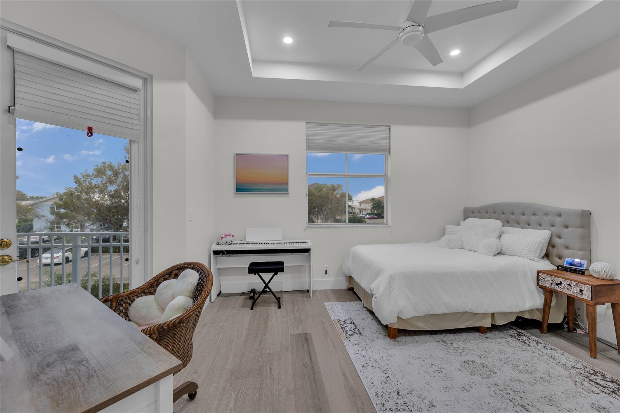 Third Bedroom offers walk in closets and French door to balcony access