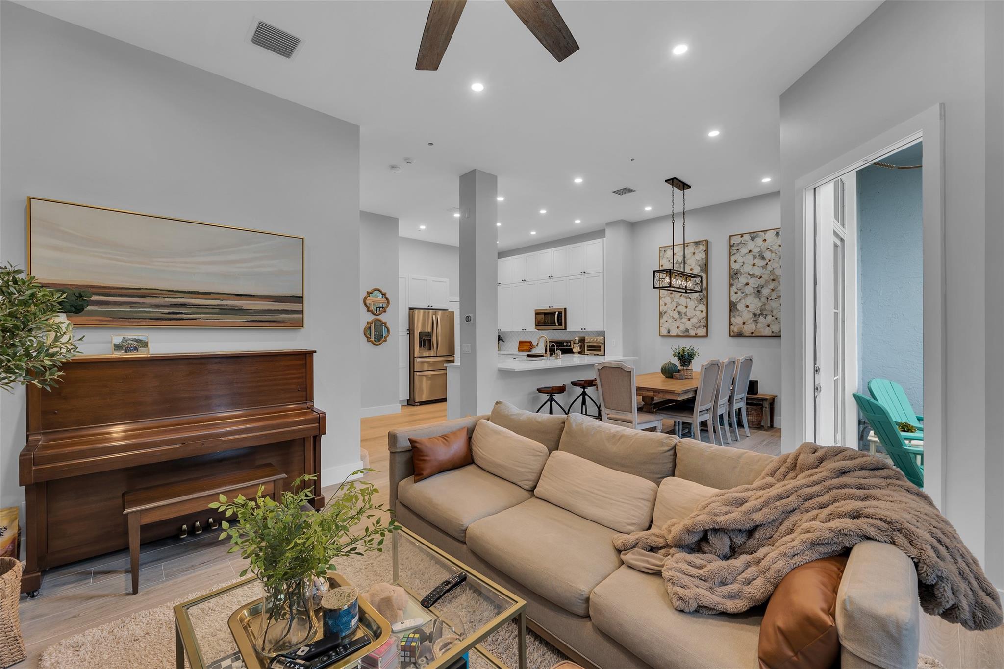 Living room is open to dining room and kitchen and great for entertaining