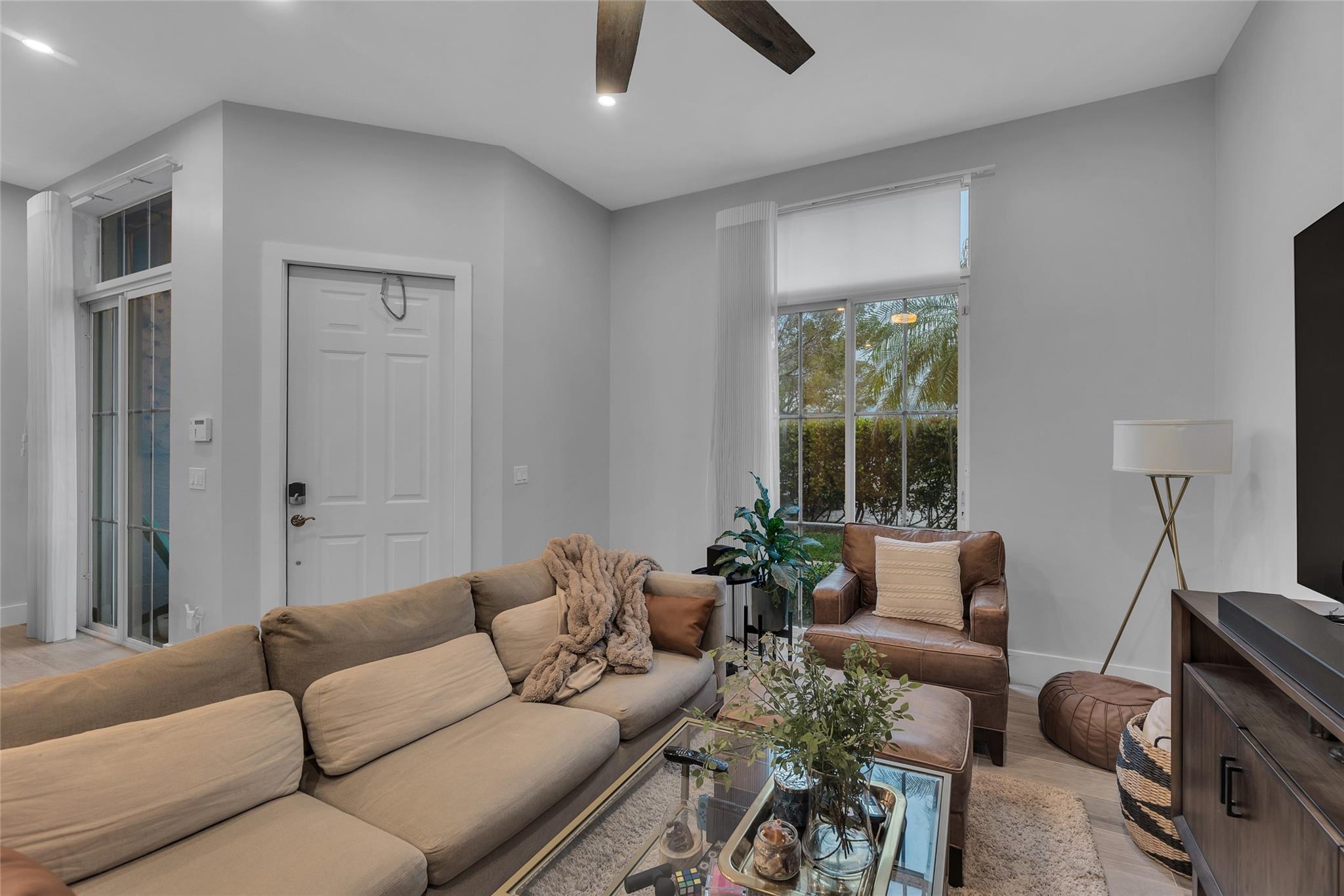 Great natural light in living room and sliders out to patio