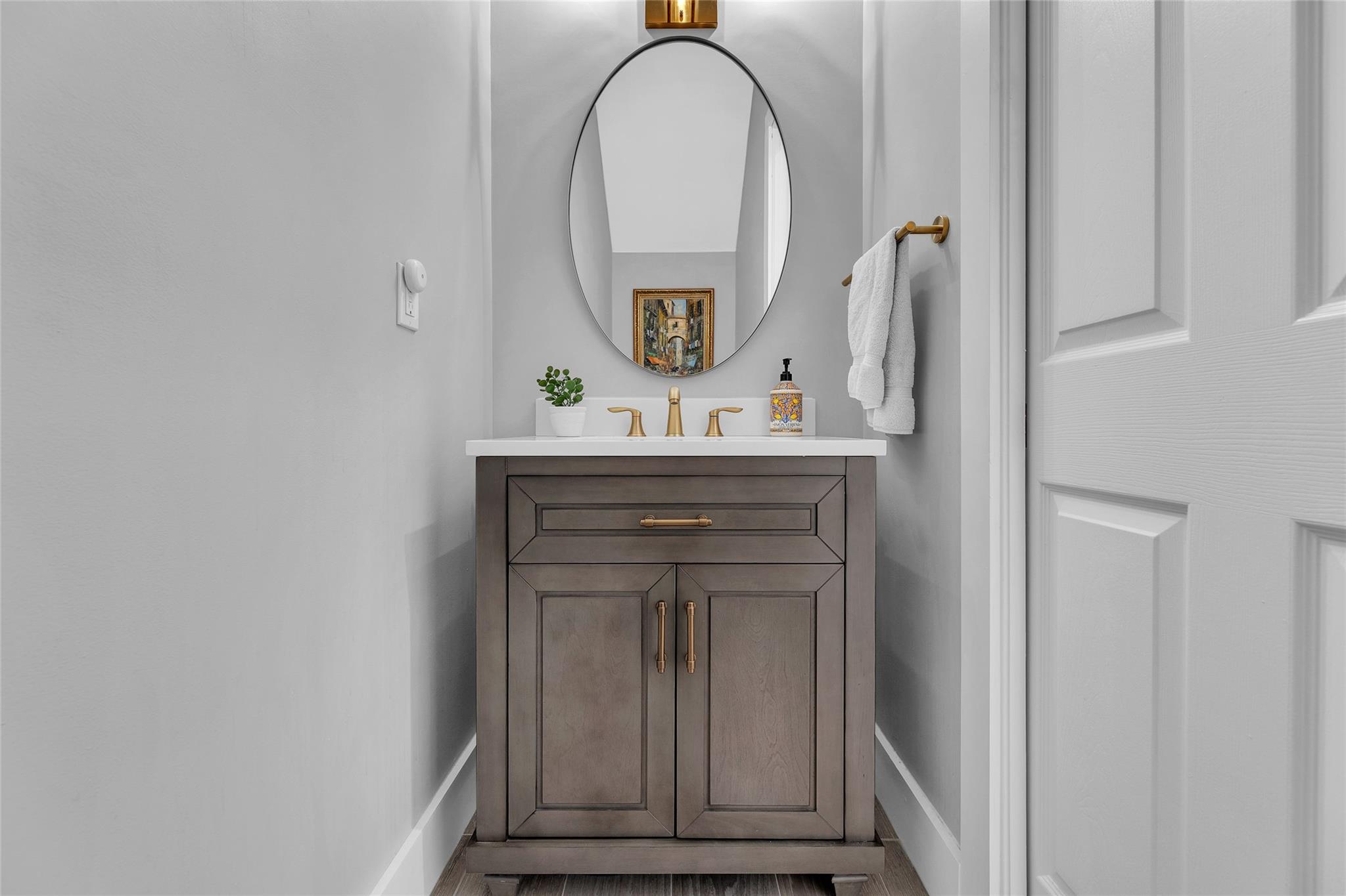 New quartz vanity counter in downstairs half bathroom