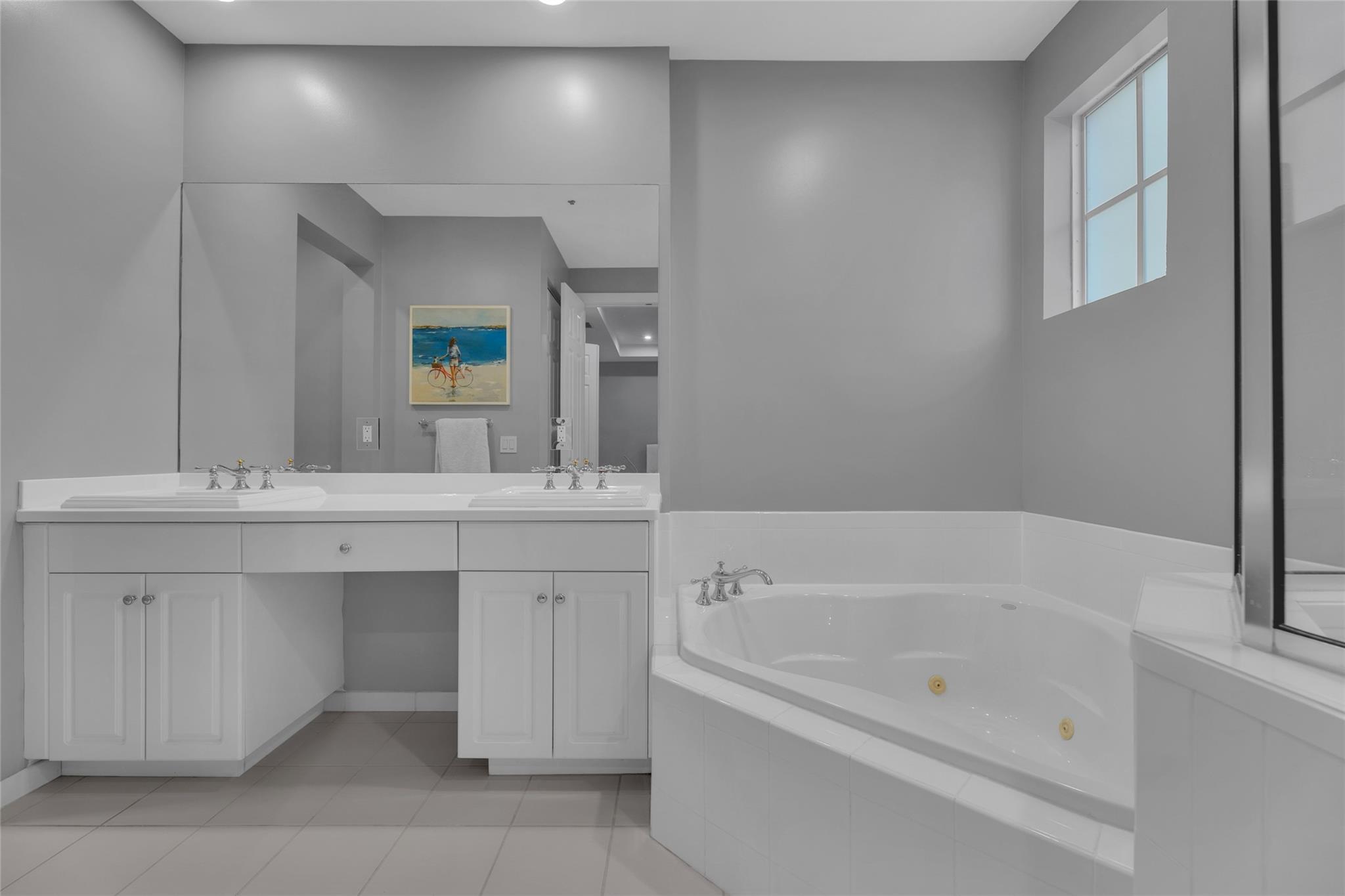 Master Bathroom with large Kohler tub with jets and double vanity