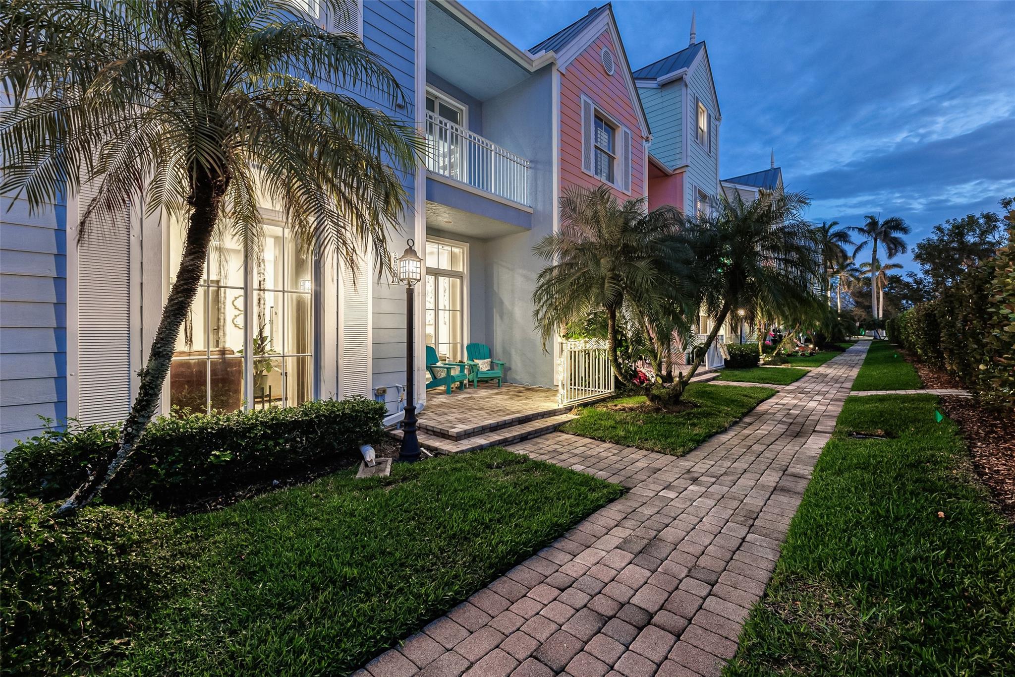 Meticulously maintained with great tropical landscaping throughout community