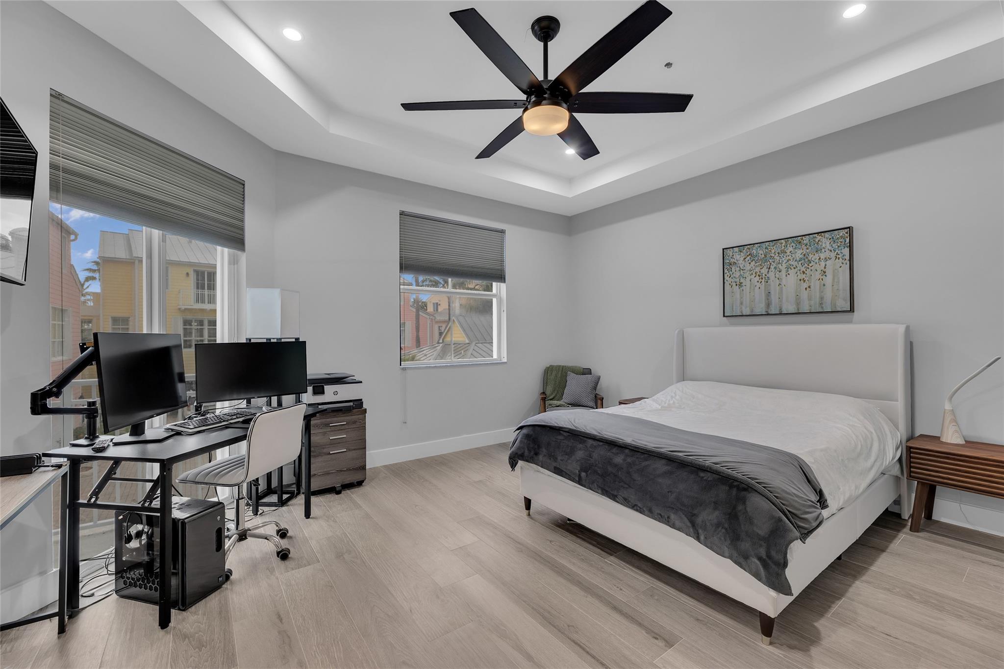 Master bedroom  offers sliders out to private balcony