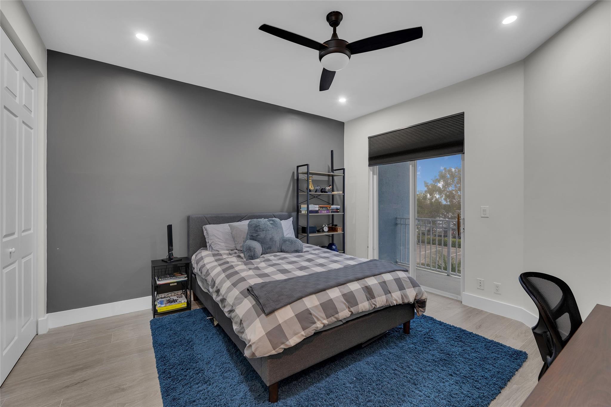 Second Bedroom with built in closet and sliders to balcony