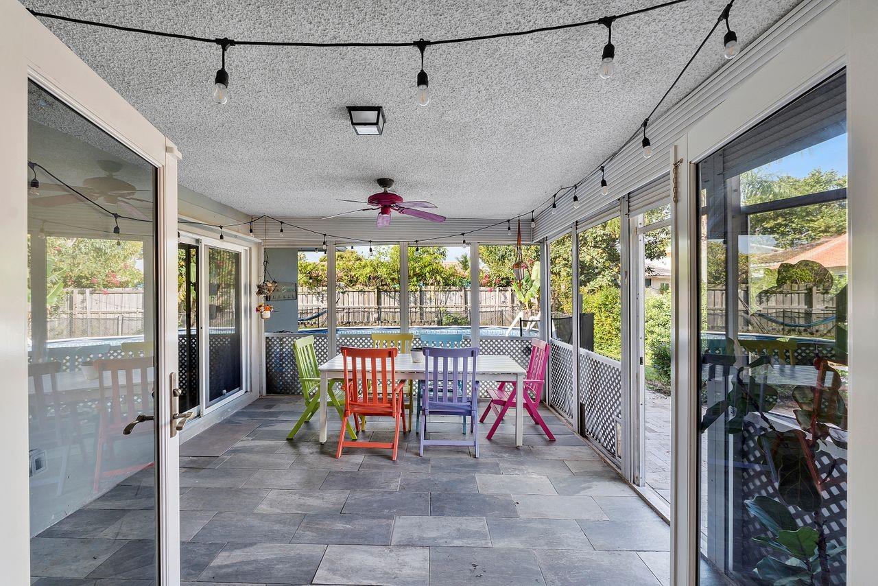 Covered Patio with Impact Doors and Roll Down Shutters