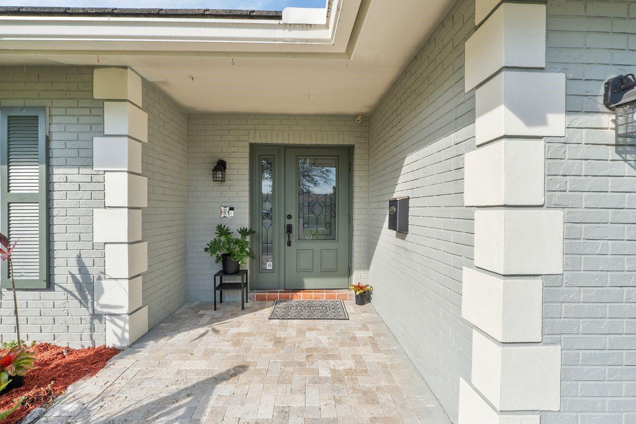 Welcoming Entry Way with Impact Front Door