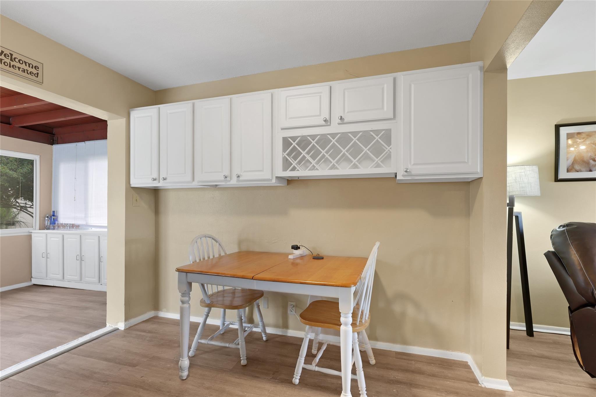 Kitchen Eating area with EXTRA Cabinets.
