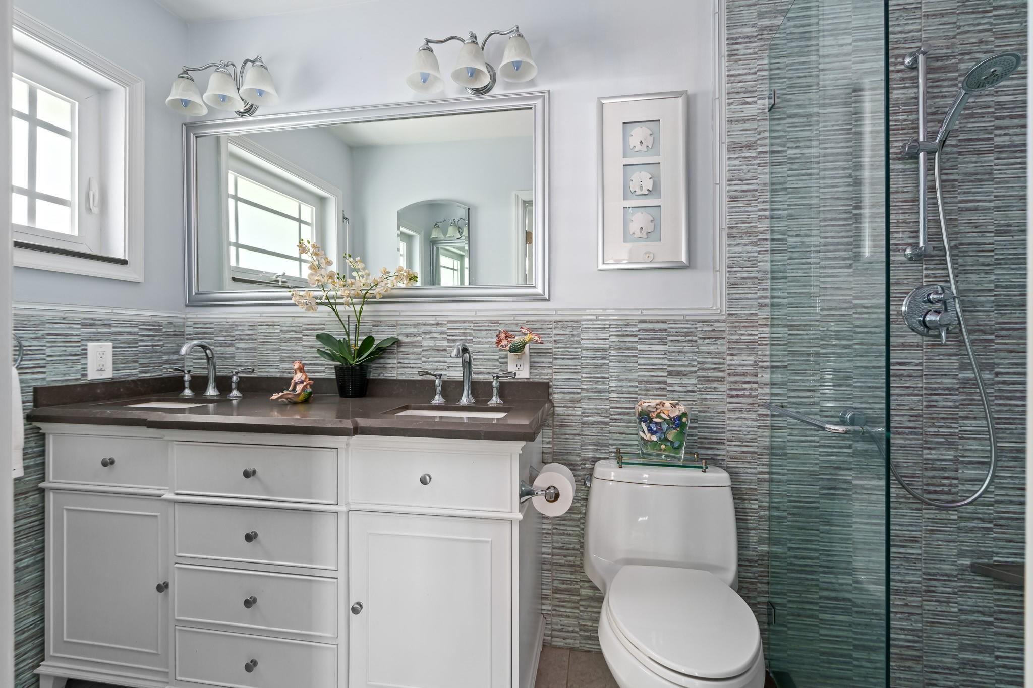 Double sinks in this en suite primary bath