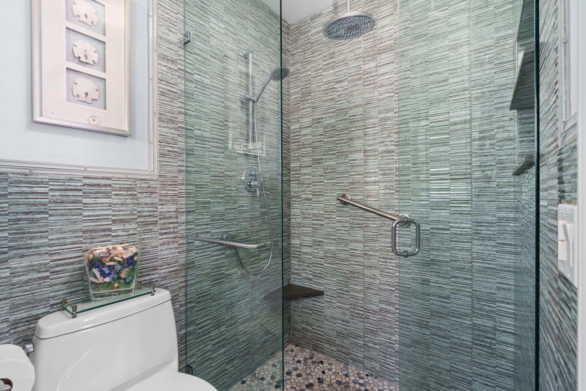 Beautiful shower with pebble floor