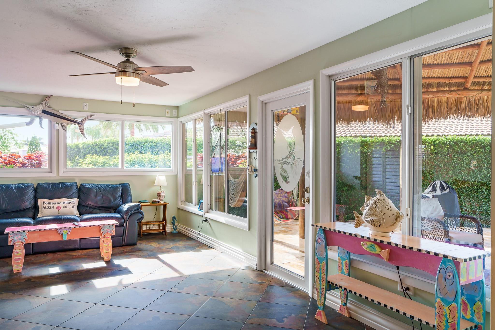 What a cheerful room this is!!  Virtually all glass!