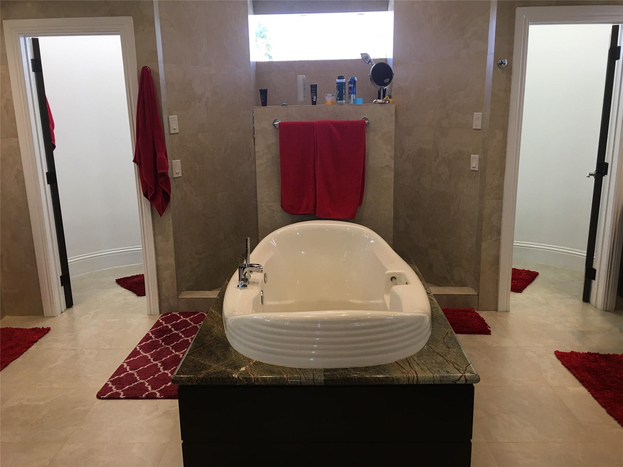 LARGE MASTER BATHROOM- HUGH DECORATIVE SPA TUB & LARGE OPEN SHOWER WITH HIS & HER'S PERSONAL AREAS