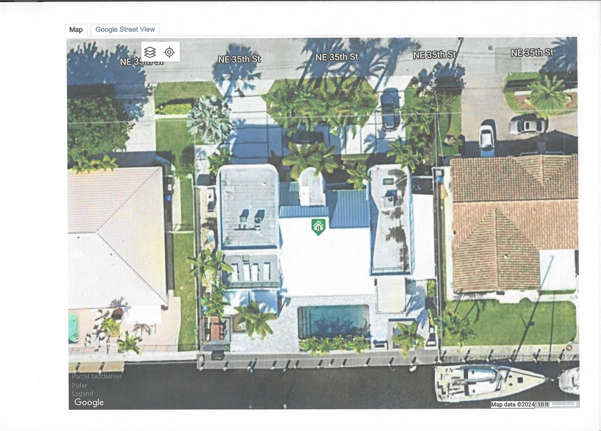 AERIAL VIEW OF PROPERTY AND NEW 110' DOCK (LIGHTS ABOVE & BELOW WATER)