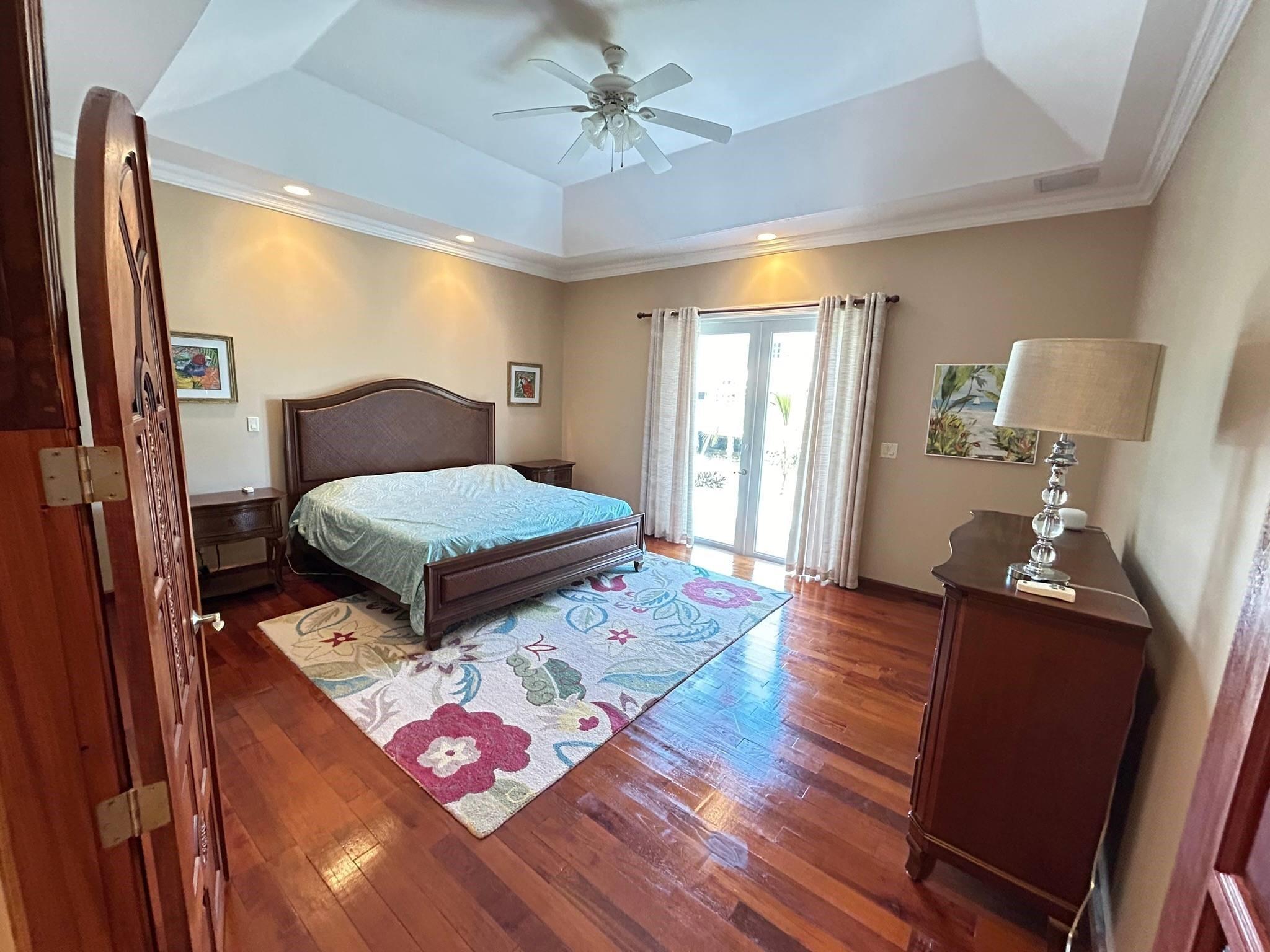 Master bedroom with teak floors