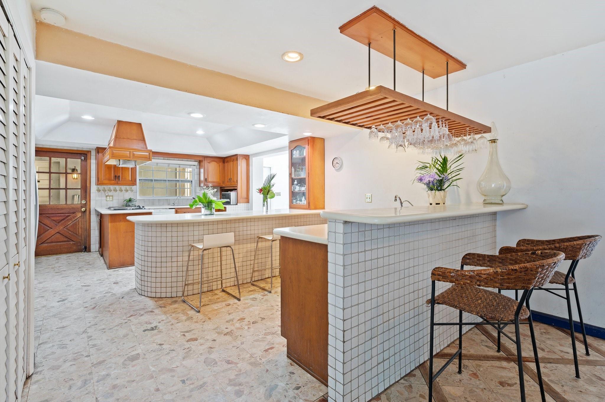 20X15 KITCHEN WITH TWO BREAKAST/BAR COUNTERS. GREAT FOR PARTIES/DINNERS