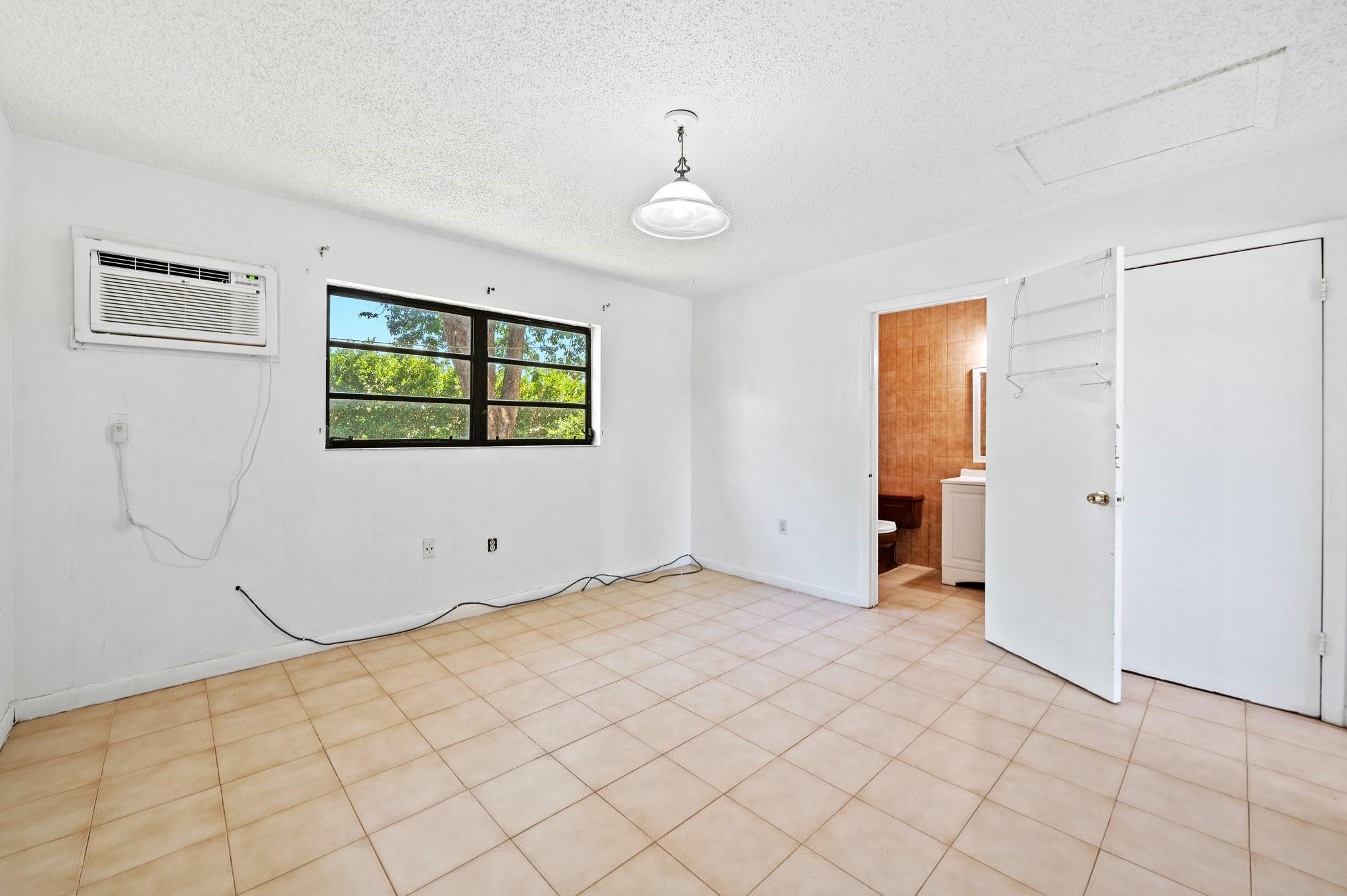 WINDOW TO BCK AREA. NATURAL LIGHT