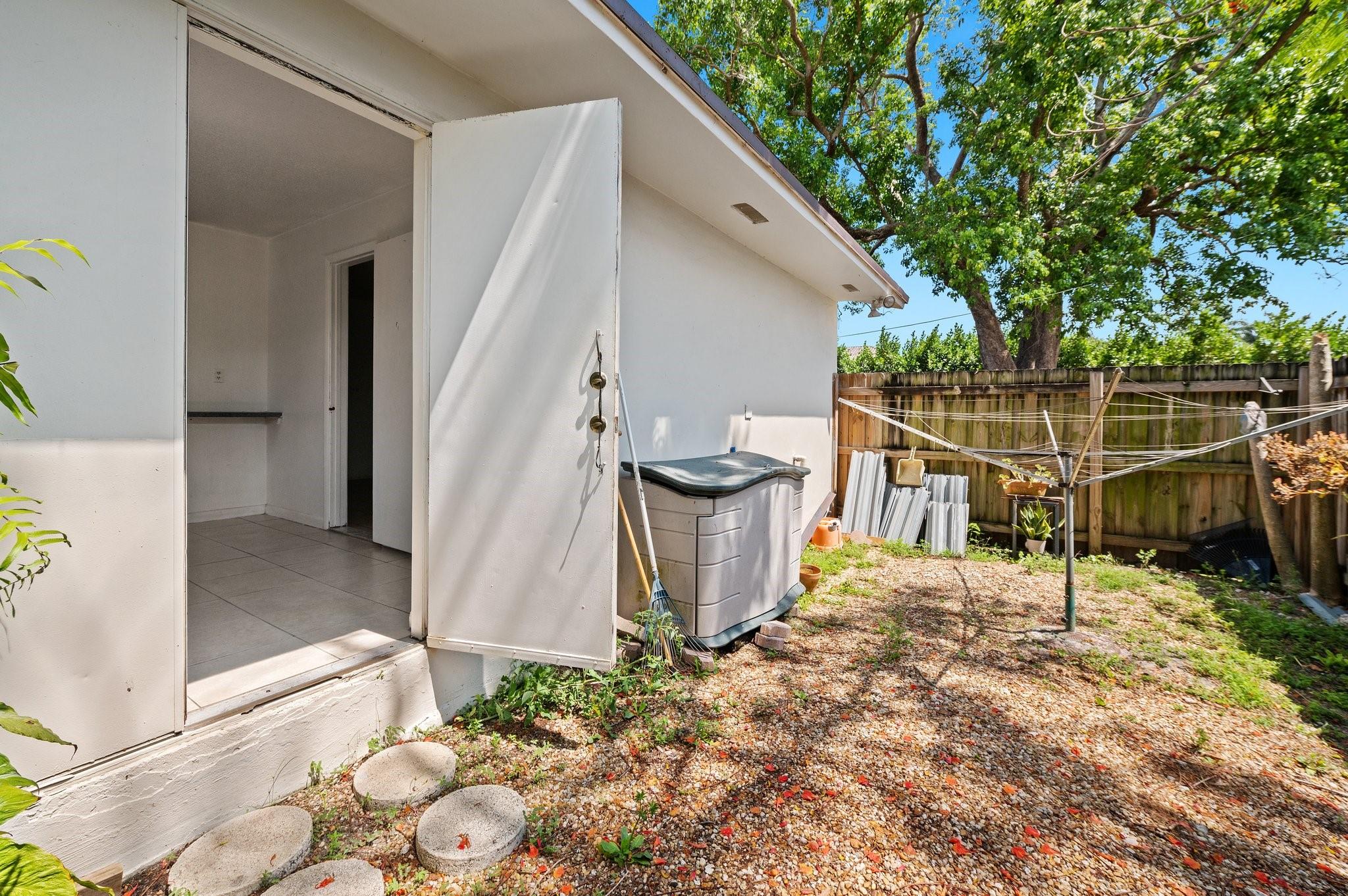 SIDE DOOR TO FENCED OUT DOOR SPACE